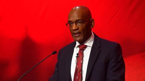 Nigel Walker giving a speech