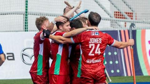 Wales players celebrate scoring against France
