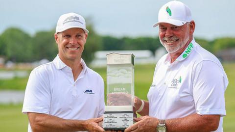 Ben Crane and Darren Clarke with the American Family Insurance Championship trophy