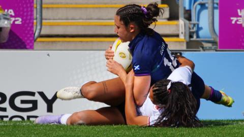 Rhona Lloyd scores a try for Scotland against Canada
