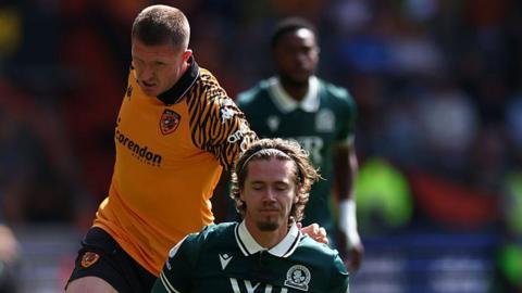 Hull's John Lundstram battles with Blackburn's Todd Cantwell