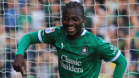 Mustapha Bundu celebrates scoring a goal