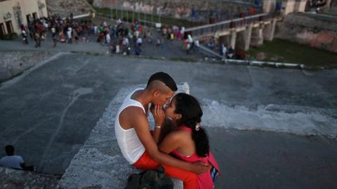 A young couple El Castillo del Morro, August 12, 2015 in Havana, Cuba