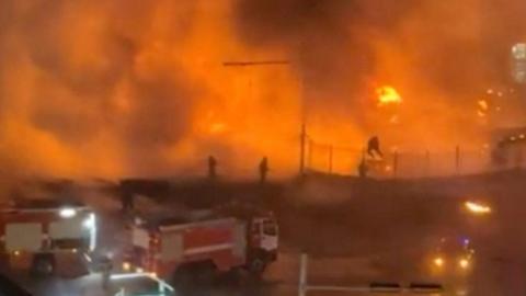 ire trucks stand near the site of fire following an explosion in Ulaanbaatar, Mongolia, January 24, 2024, in this screengrab obtained from a social media video