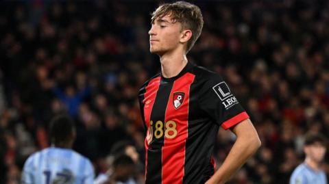 Dean Huijsen celebrates
