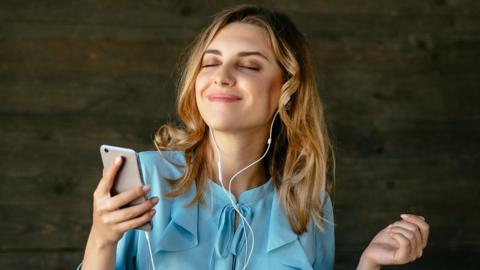 Woman listening to radio