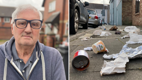 Resident Malcolm Davies wearing a blue hoody / rubbish strewn across the pavement