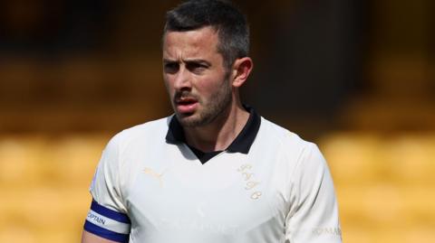 Port Vale captain Ben Garrity in action