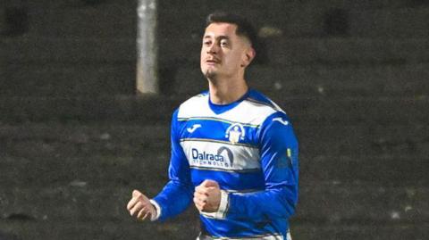 Michael Garrity celebrates