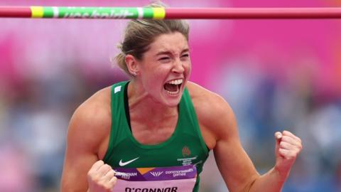 Northern Ireland heptathlete Kate O'Connor celebrates her high jump performance in Birmingham