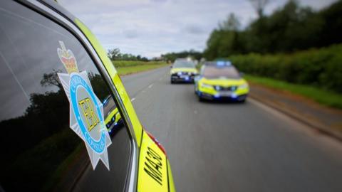 Cumbria Constabulary cars pictured on a road