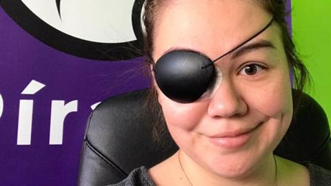 Eva Pandora Baldursdottir sports an eyepatch following an eye injury