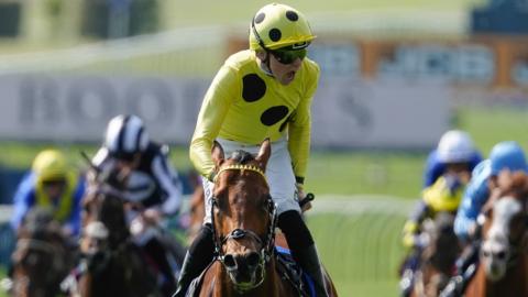 Billy Loughnane wins the 2,000 Guineas on Bow Echo