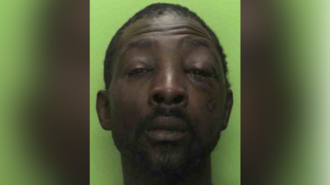 A custody image taken by Nottinghamshire Police of Abubakarr Haruna