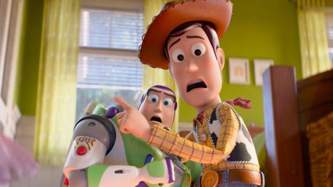 Buzz Lightyear and Woody looking on in fear