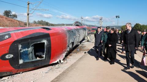 Spain's King Felipe and Queen Letizia visit the site of the deadly derailment of two high-speed trains near Adamuz, in Cordoba, Spain, January 20, 2026