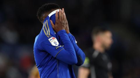 Patson Daka covers his face is despair as Leicester are relegated