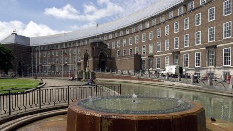 An external shot of Bristol City Hall taken form near the fountain