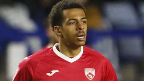 Caleb Watts in action for Morecambe