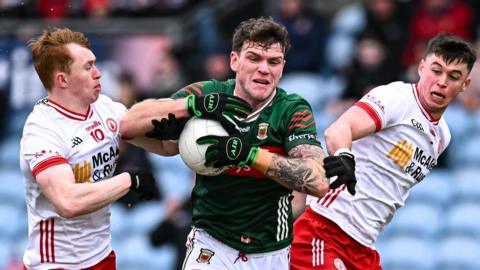 Tyrone's Seanie O'Donnell and Liam Gray battle with Mayo's Jordan Flynn at Castlebar