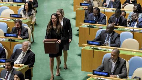 UN officers hold ballot boxes at the election of new members of the UN Human Rights Council on October 12, 2018 at the UN in New York.