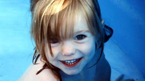 Madeleine McCann looking up and smiling