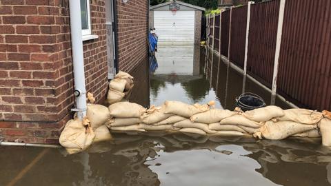 Sandbags and water