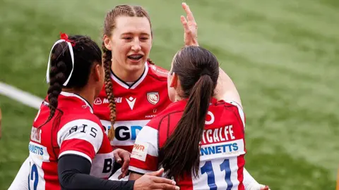 Gloucester-Hartpury's Nel Metcalfe celebrates scoring her sides first try