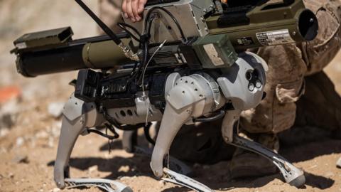 An anti-tank weapon is strapped to a robot dog during a US Marines test