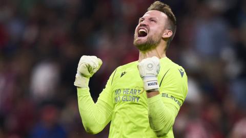 Simon Mignolet of Club Bruges reacts after they qualify for the Champions League knockout stages