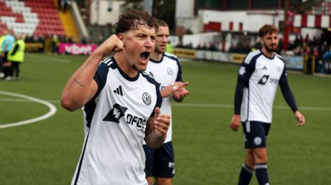 Baris Altintop celebrates Portadown's late win against Cliftonville