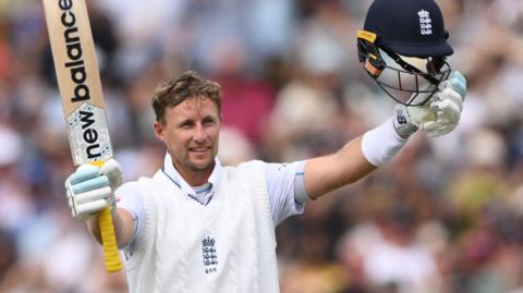 Joe Root celebrates a century against India
