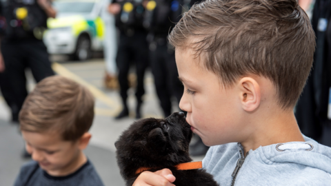 Oscar with a police puppy