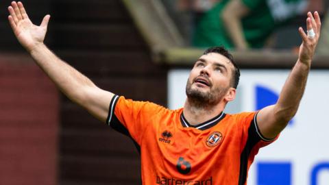 Tony Watt celebrates