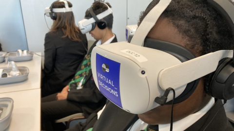 Schoolchildren using VR headsets
