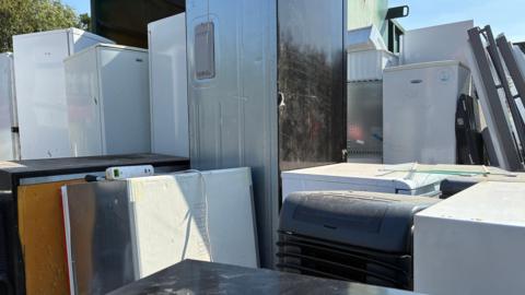 Fridges and freezers at a recycling centre