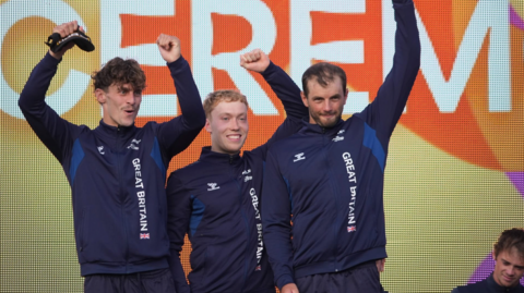 Adam Burgess, Ryan Westley and Luc Royle celebrate