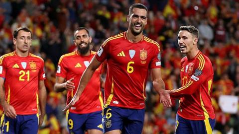 Mikel Merino celebrates scoring for Spain