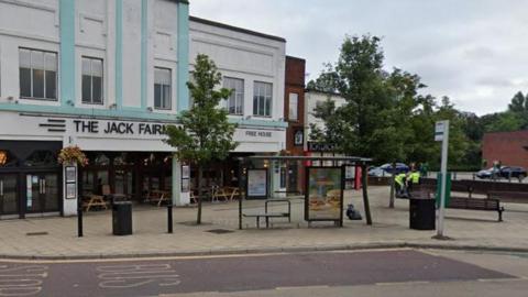 A bus stop outside The Jack Fairman pub