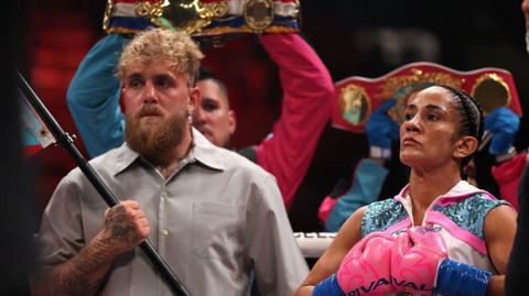 Jake Paul waves the Puerto Rico flag before Amanda Serrano's fight with Katie Taylor