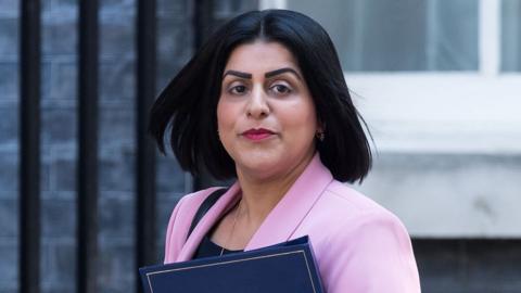 Shabana Mahmood wearing a bright pink blazer.