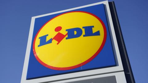 A close-up of a large Lidl sign
