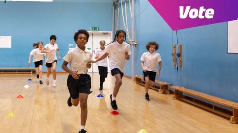 Kids taking part in PE lesson at school.