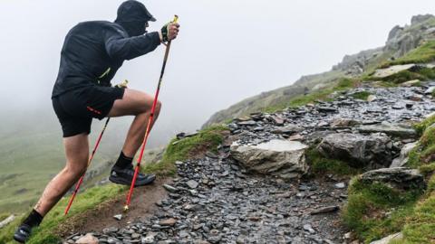 A trail runner in Eryri, also known as Snowdonia