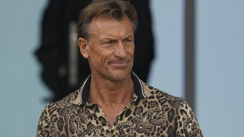 Herve Renard watches a match from the stands at the 2023 Africa Cup of Nations