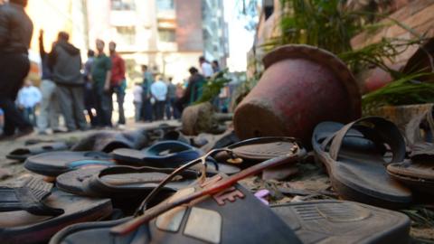 Abandoned sandals at the scene of the stampede in Chittagong, Bangladesh