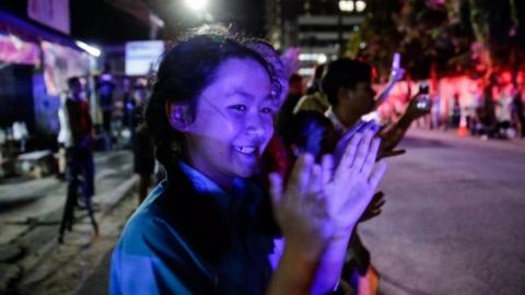 They were carrying the last boy and the coach rescued after 17 days in the Tham Luang cave system.