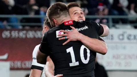 Saracens players celebrate