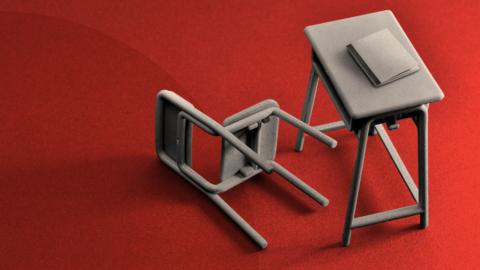 A treated image of a desk with a chair toppled over