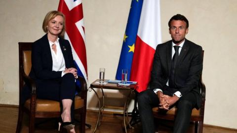 British Prime Minister Liz Truss, left, poses with France's President Emmanuel Macron